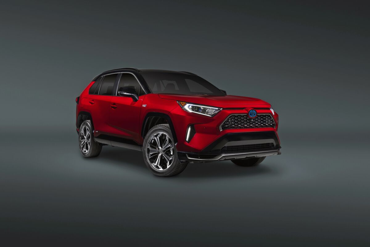 This photo provided by Toyota shows the 2022 Toyota RAV4 Prime, a small plug-in hybrid SUV with an electric range of about 42 miles and a combined fuel economy rating of 38 mpg. (Courtesy of Toyota Motor Sales U.S.A. via AP)