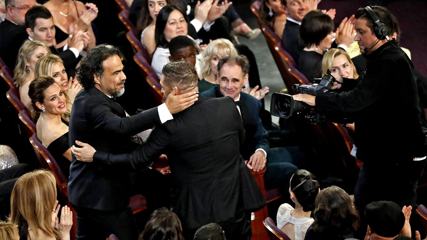 Alejandro Gonzalez Iñarritu, winner of Best Director with Tom Hardy