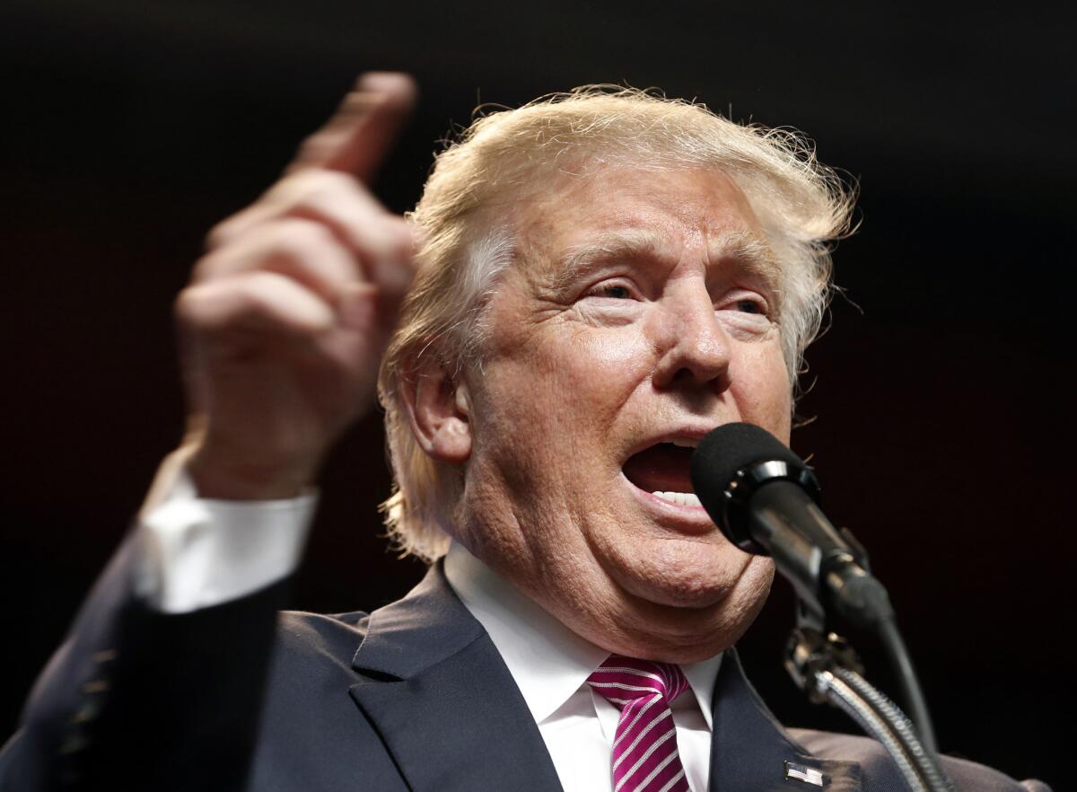 Presumptive Republican presidential nominee Donald Trump speaks during a rally in Charleston, W.Va., on Thursday.