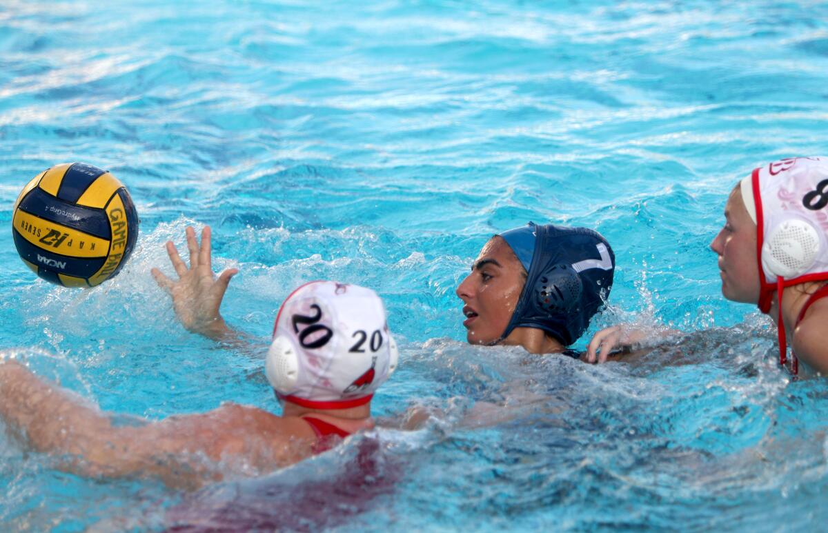 Burbank High water polo player Sera Shabhazian was kept under pressure in home game vs. Burroughs High, at the Bulldogs pool on Wednesday, Jan, 29, 2020.