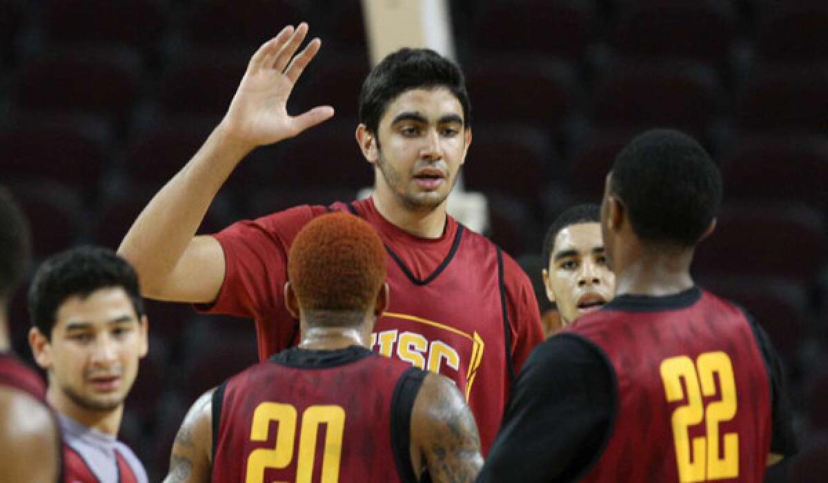 USC's Omar Oraby, center, with teammates during practice at the Galen Center.