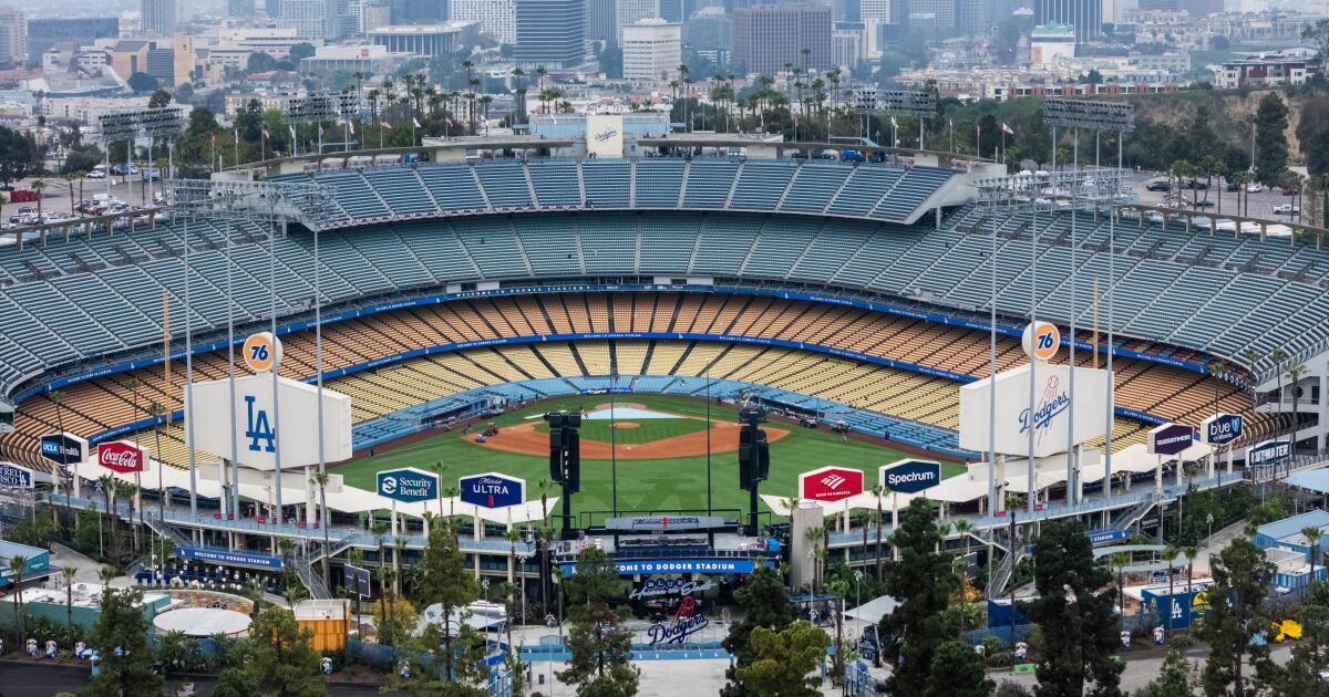 Commentary: The Dodgers lobbied on a Chavez Ravine reparations bill. They won’t say how.