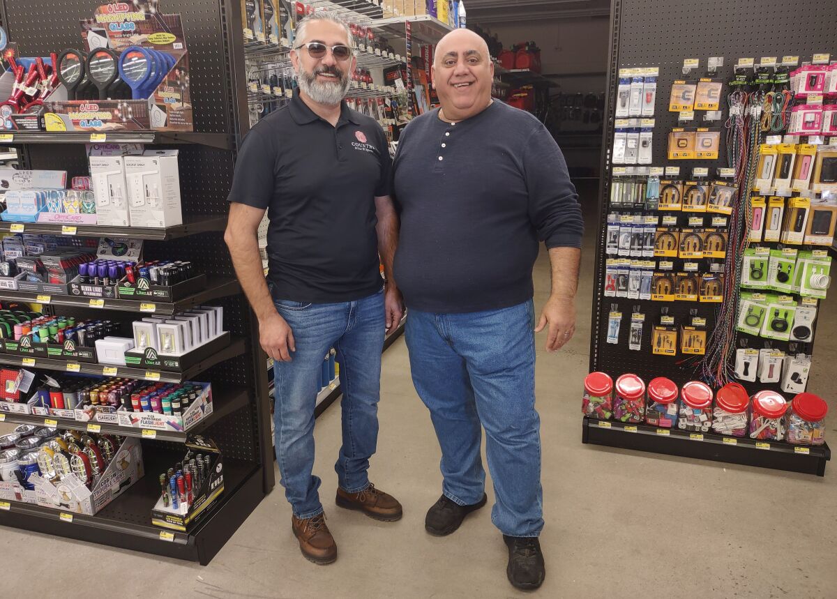 Managers Danny Ibrahim, left, and Steve Hermiz are preparing to open the Country Hardware Store True Value in February.