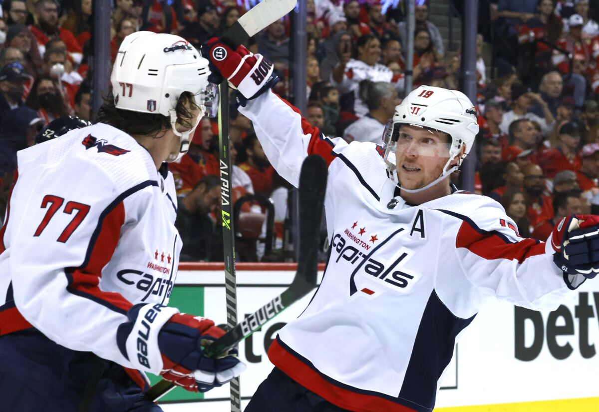 Washington Capitals center Nicklas Backstrom and right wing T.J. Oshie celebrate the go-ahead goal by Oshie.