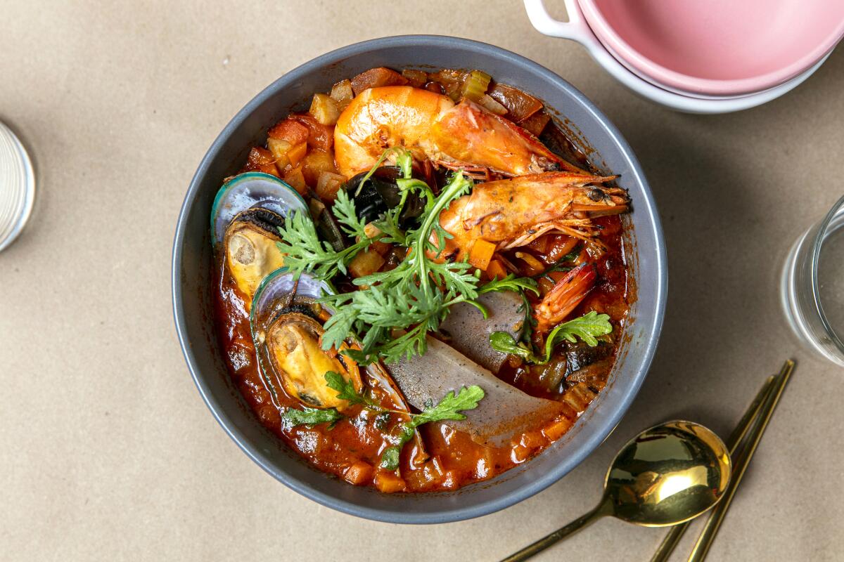 Bouillabbong, a fusion of a traditional bouillabaisse with a spicy Korean noodle and seafood soup, from Hanchic.
