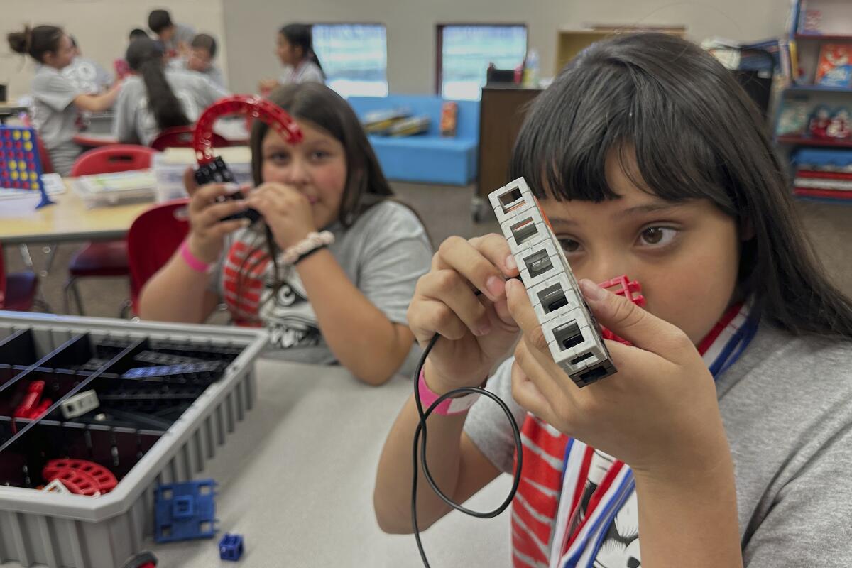 Loving Elementary School students participate in a science, technology, engineering and math lab