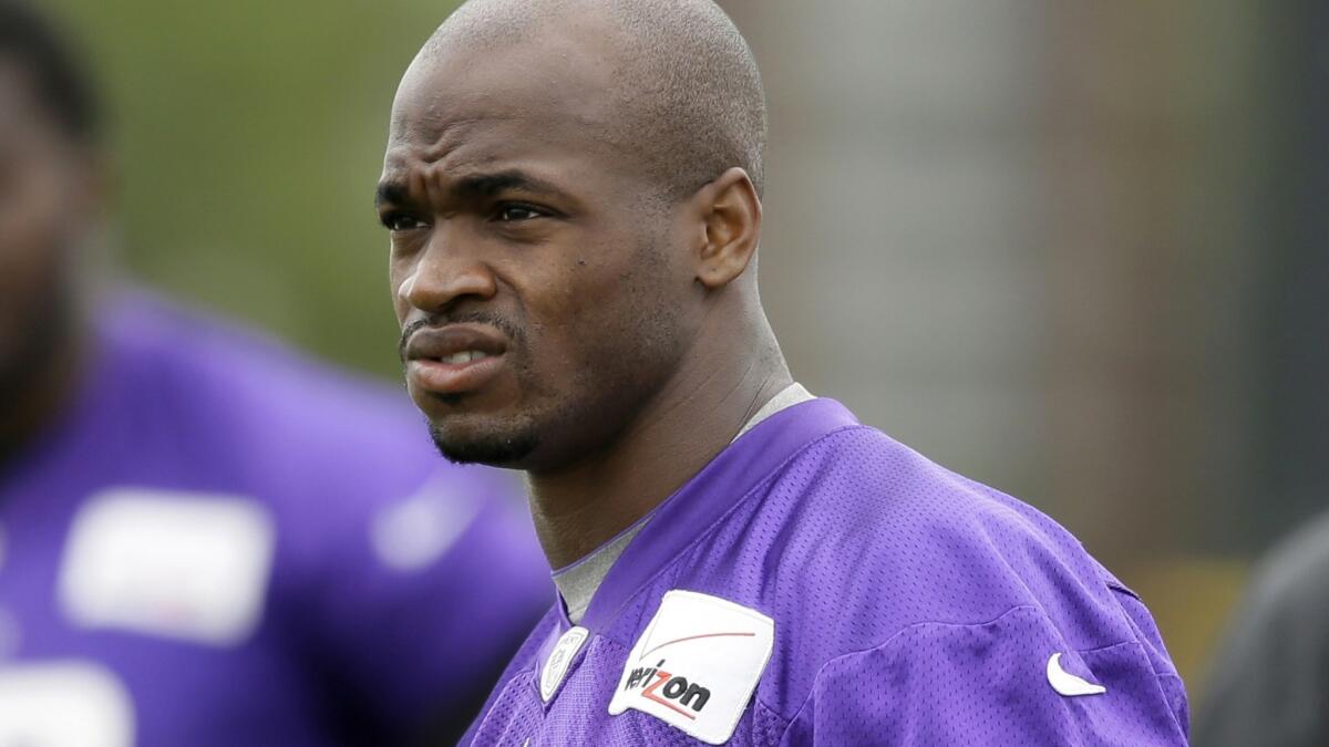 Vikings clear Adrian Peterson to return to team - Los Angeles Times