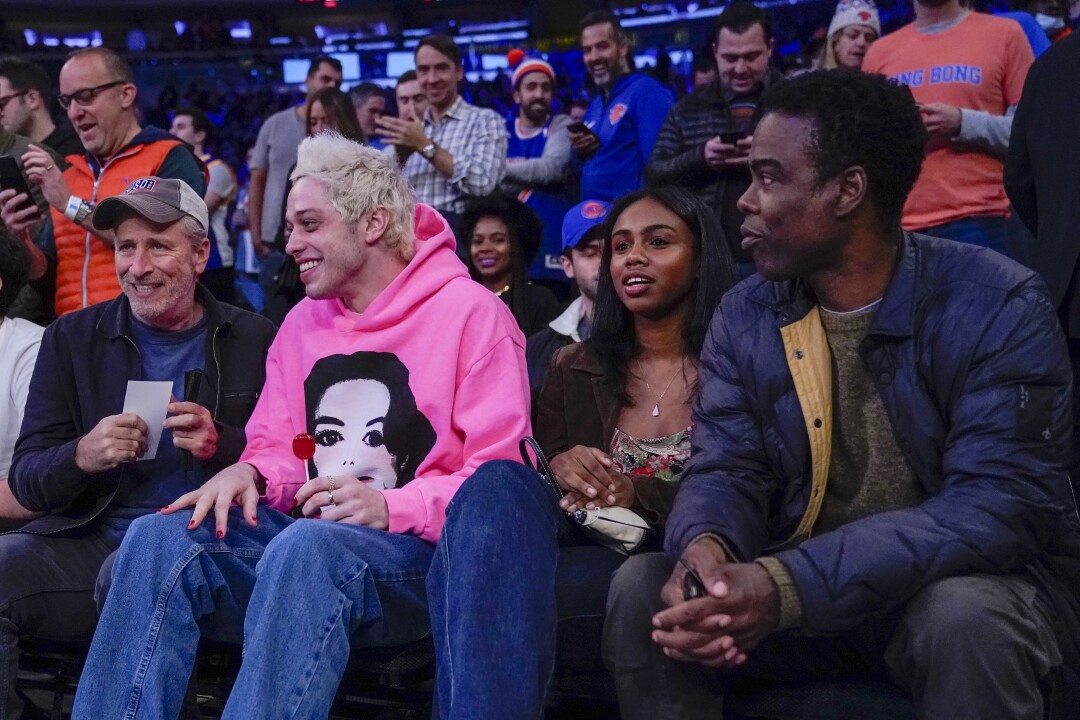 Comedians Jon Stewart, left, Pete Davidson, second from left, and Chris Rock