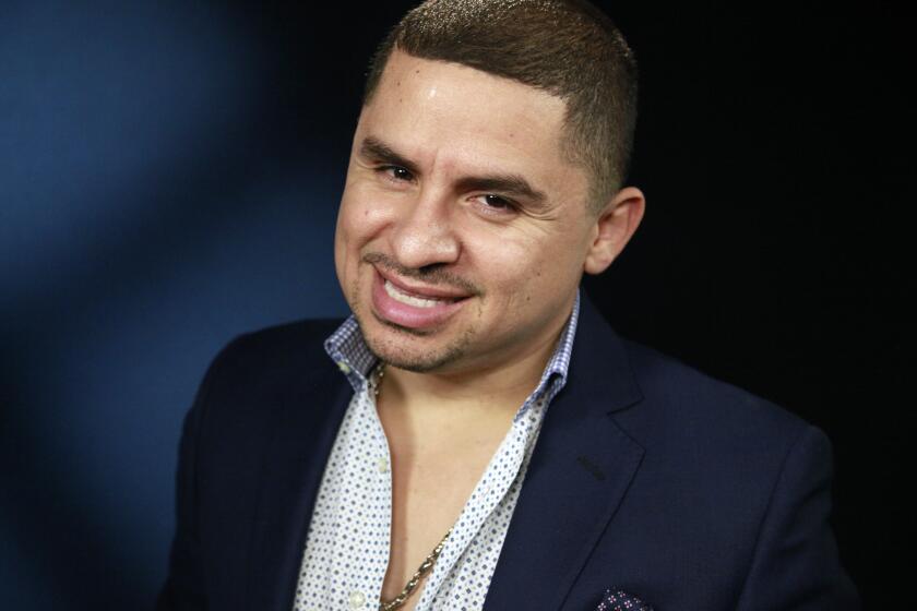 FILE - This Aug. 6, 2014 photo shows Mexican singer Larry Hernandez 