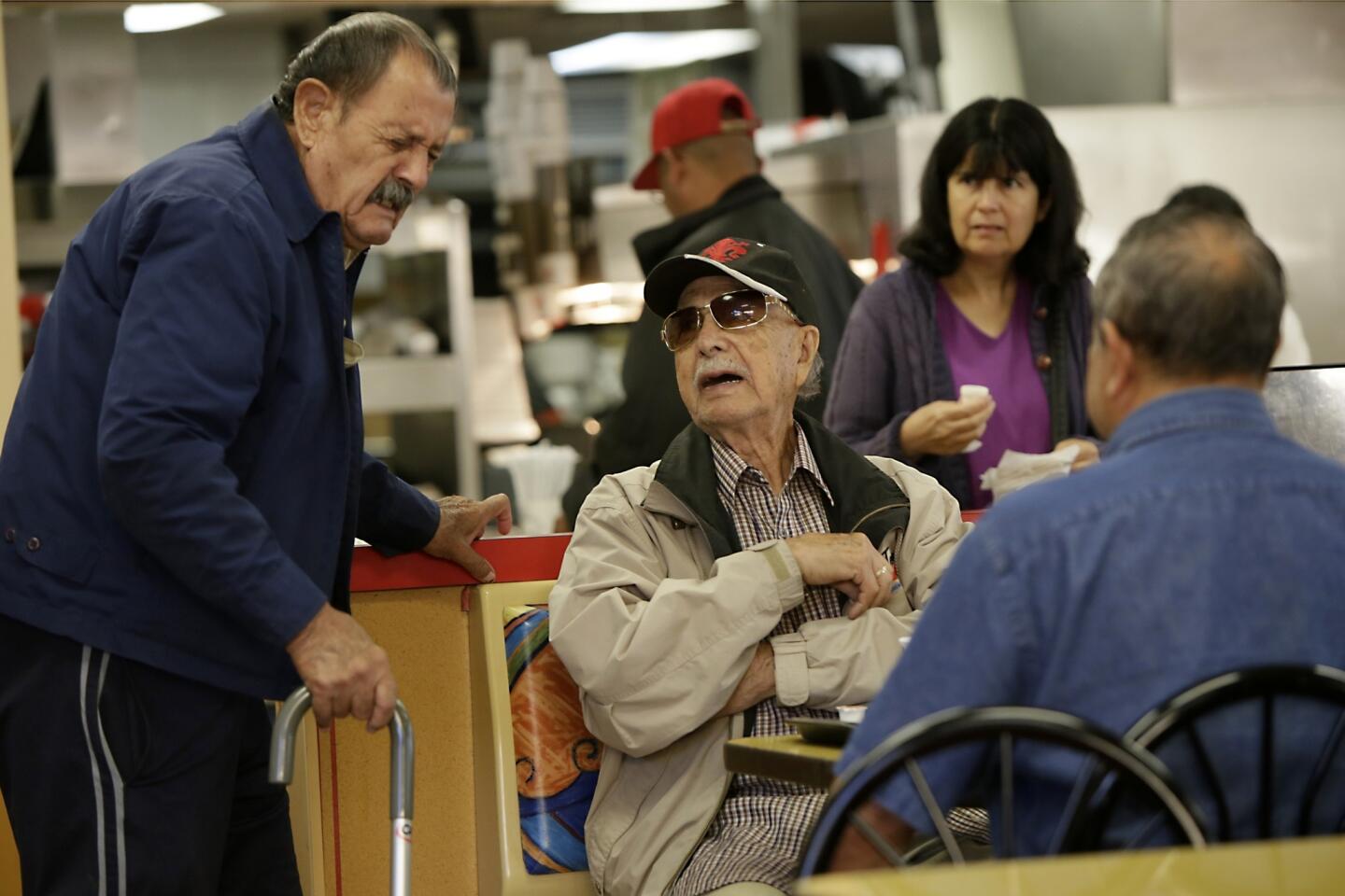 Victor de La Torre, 82, grimaces after hearing that Salvador Jaramillo's longtime walking partner Jose Noriega, 101, had been killed by a car while crossing the street to meet Jaramillo in Boyle Heights.