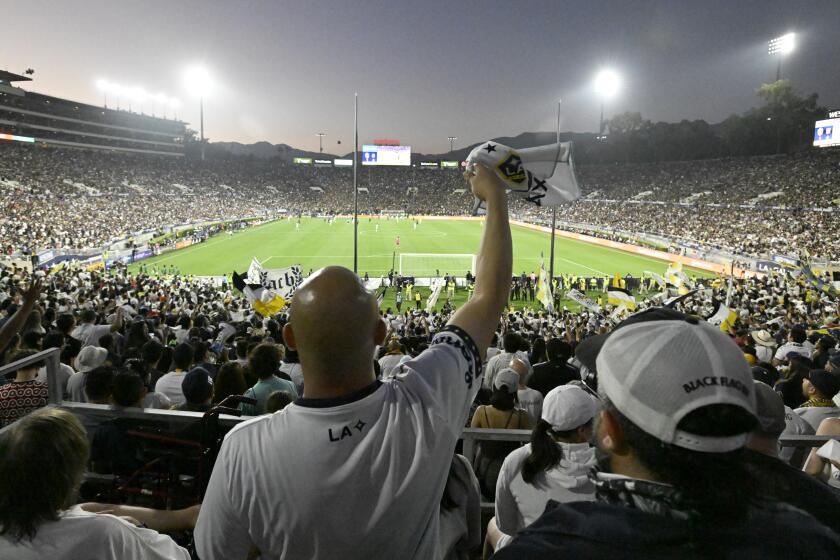 PASADENA, CA - JULY 04: LA Galaxy fans cheer as the team plays against Los Angeles FC.