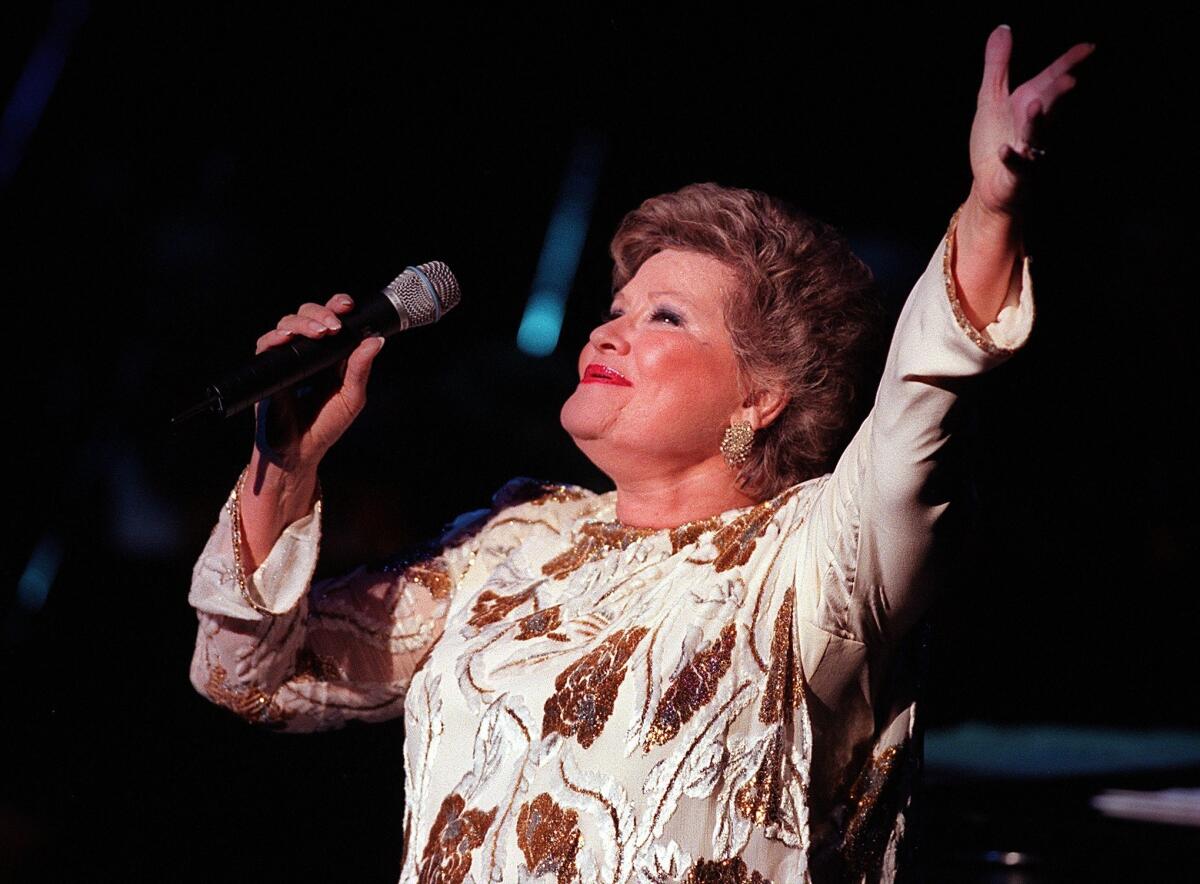 Singer Patti Page, pictured during a 1998 performance in Cerritos, died on New Year's Day at age 85.