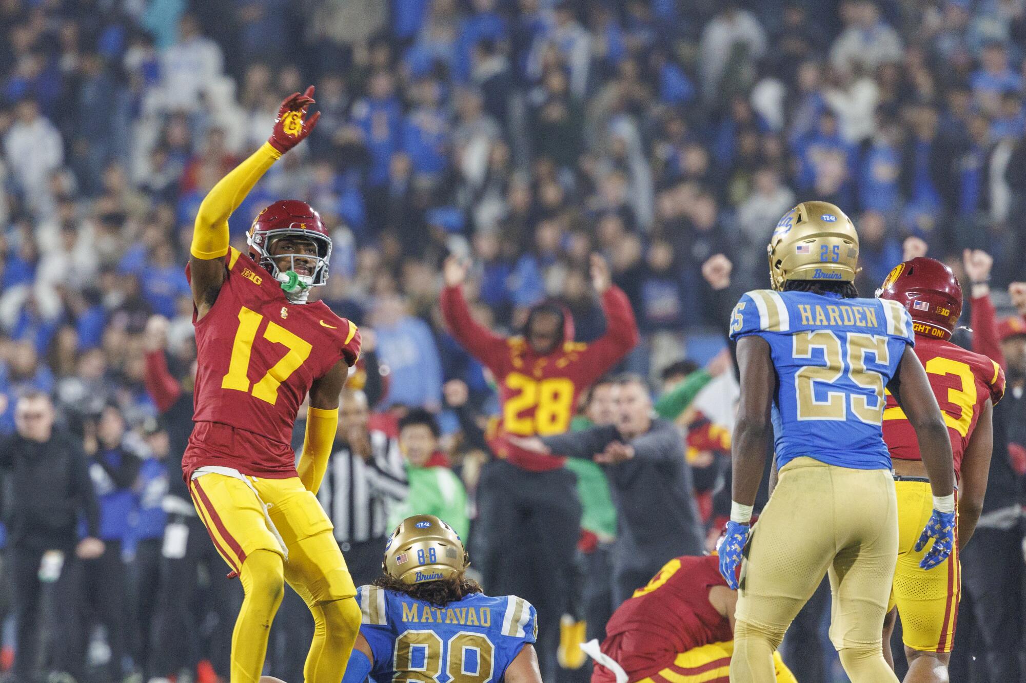 USC cornerback DeCarlos Nicholson celebrates after breaking up a pass intended for UCLA tight end Moliki Matavao