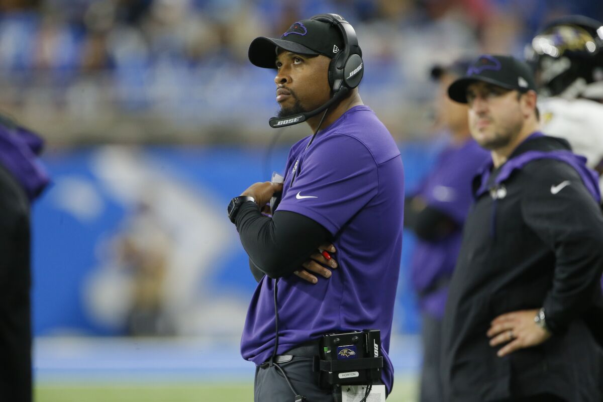 FILE - Baltimore Ravens special teams coach Chris Horton watches during the second half of an NFL football game against the Detroit Lions in Detroit, on Sept. 26, 2021. The 37-year-old Horton, a former NFL safety, just finished his third season in charge of Baltimore's special teams. (AP Photo/Duane Burleson, File)