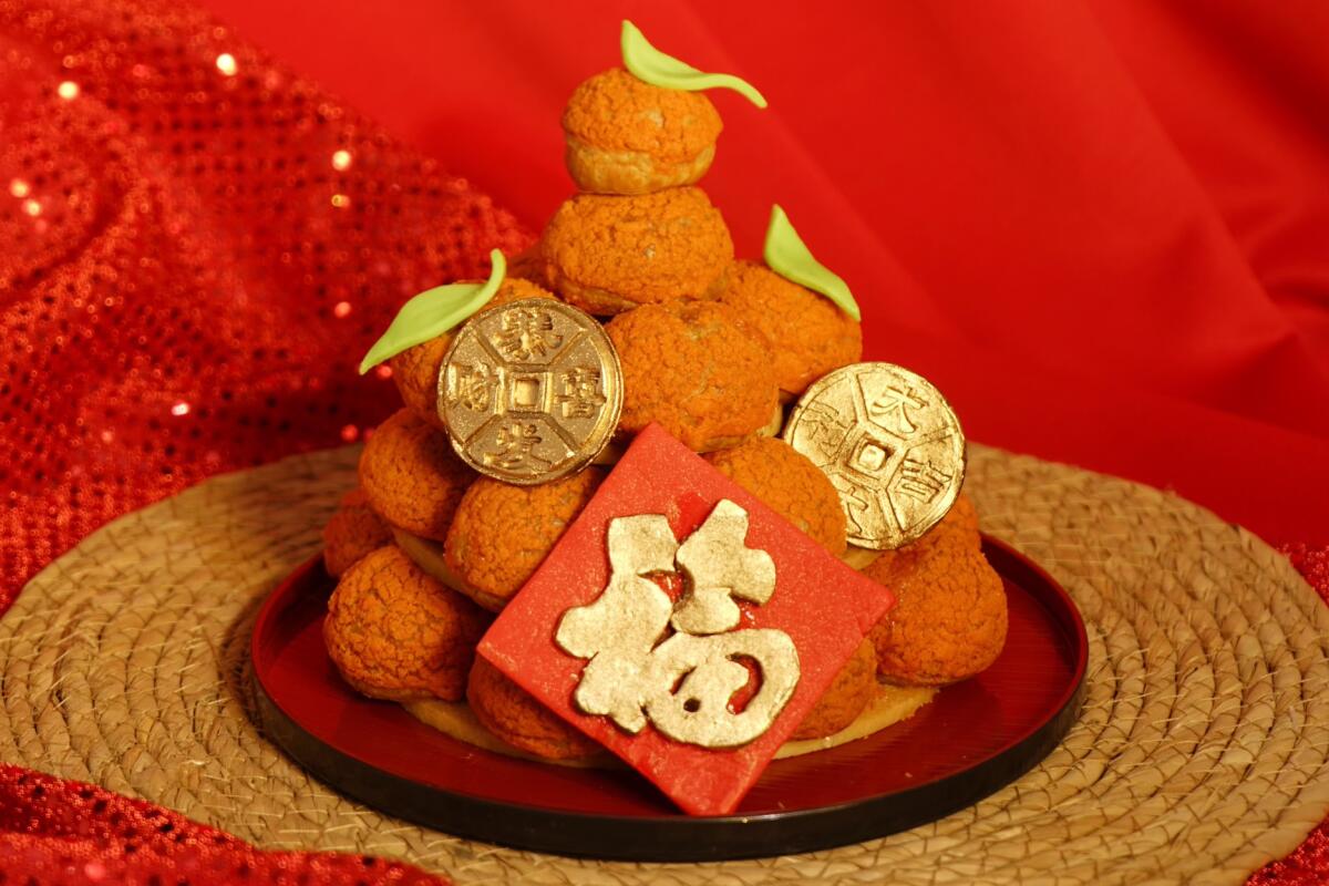 Go Cakes is offering a Lucky Mandarin Tree with a tower of 20 cream puffs for Lunar New Year.