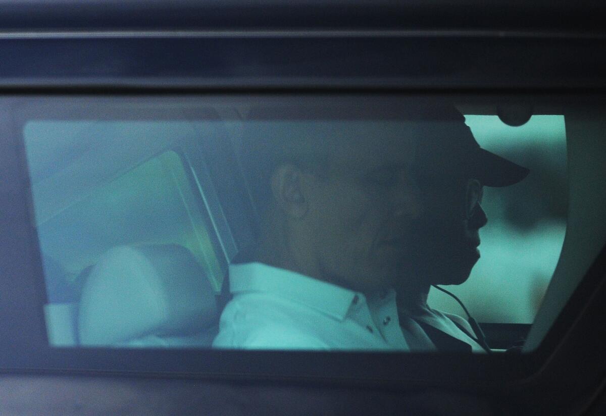 President Obama and First Lady Michelle Obama leave their Hawaii vacation home for a hiking trip Friday.