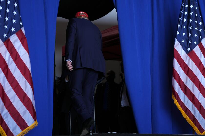 Republican presidential nominee former President Donald Trump departs after speaking during a campaign rally at Dodge County Airport, Sunday, Oct. 6, 2024, in Juneau, Wis. (AP Photo/Julia Demaree Nikhinson)