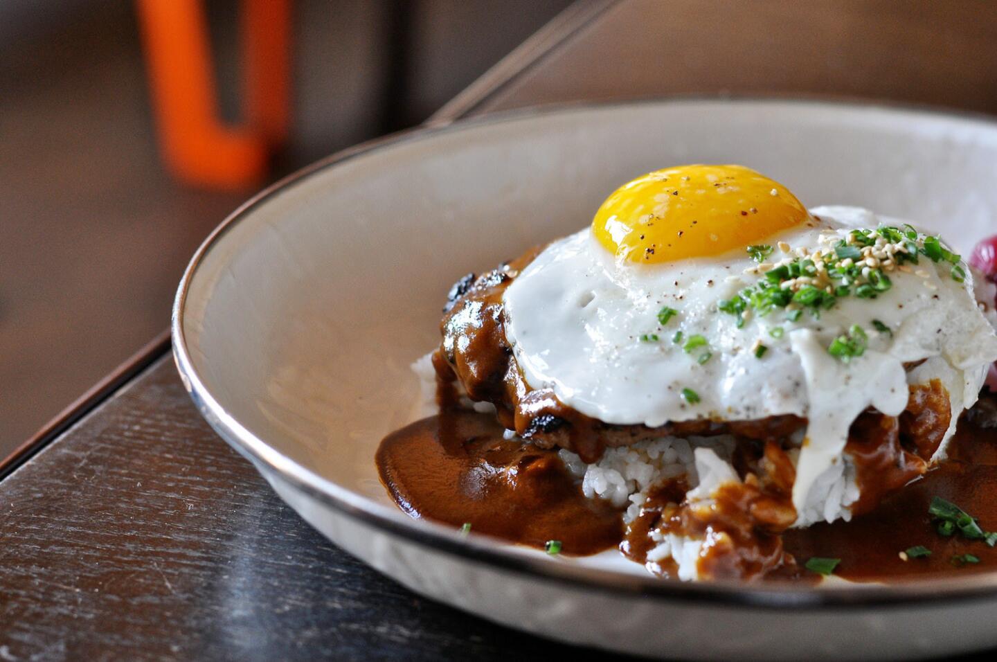A-Frame serves the Loco Moco, with "hambagu" steak, rice, curry gravy, egg and pickled pearl onions.