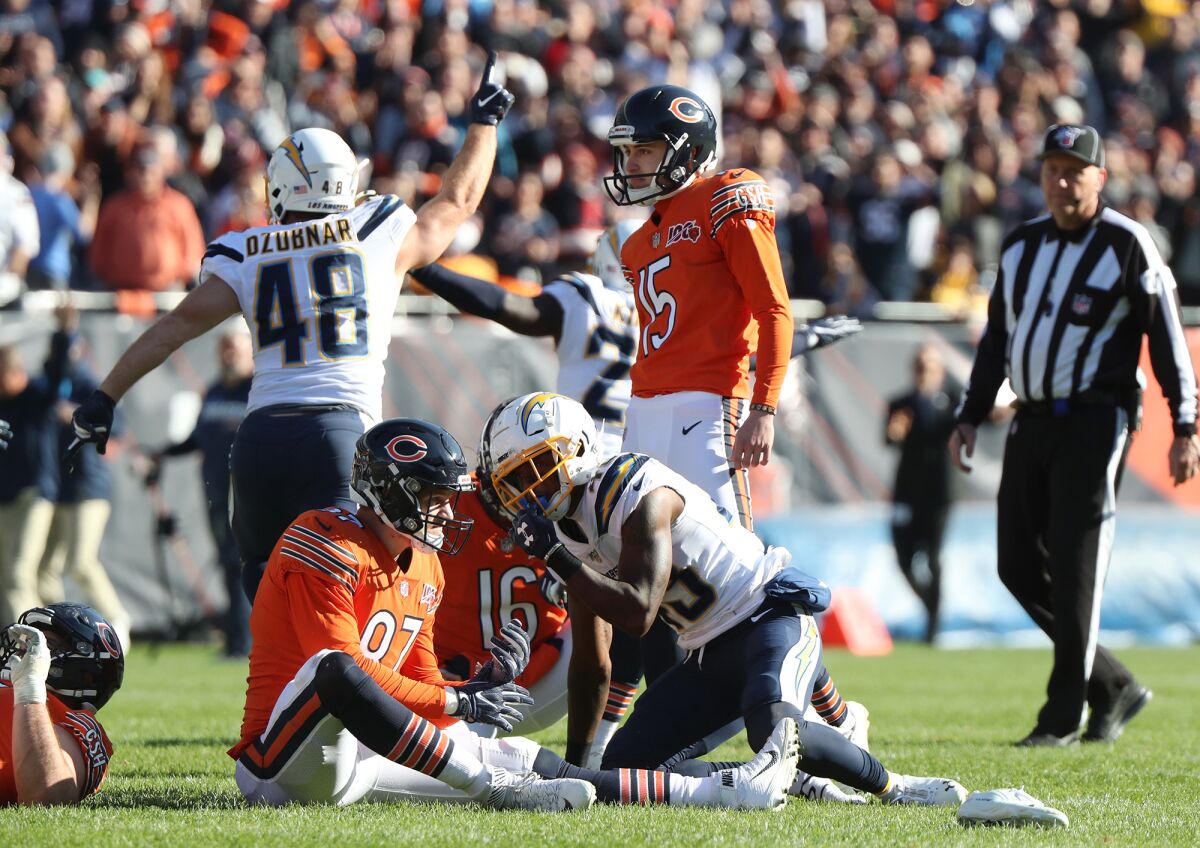 Chicago Bears kicker Eddy Pineiro stands alone after missing a 41-yard field-goal attempt as time expires in the Chargers' 17-16 win Sunday at Soldier Field.