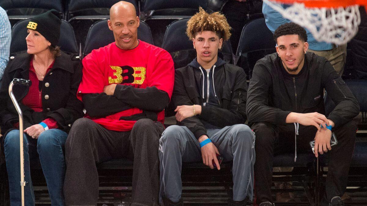 From left, Tina Ball, LaVar Ball, LaMelo Ball and LiAngelo Ball look on as the New York Knicks welcome the Lakers to Madison Square Garden in New York on Tuesday.
