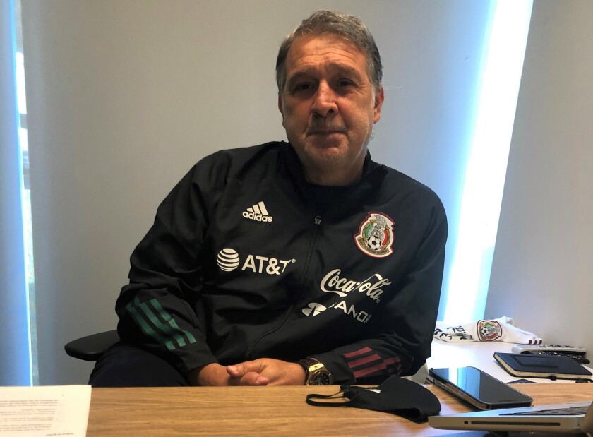Mexico coach Tata Martino sits in his office at El Tri's training facility.