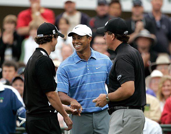 The big three, from left, Adam Scott, Tiger Woods and Phil Mickelson, meet at the first tee on the first day of the U.S. Open at Torrey Pines Golf Course.