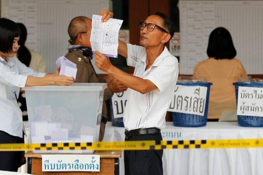 Mandatory Credit: Photo by PONGMANAT TASIRI/EPA-EFE/REX (10165313ah) Thai electoral officials count ballots after voting closed in the general election, at a polling station in a temple in Chiang Mai province, northern Thailand, 24 March 2019. More than 51million Thais are eligible to cast their vote on the 24 March 2019 general election, the first poll in five years since the May 2014 military coup. Thailand general election, Chiang Mai - 24 Mar 2019 ** Usable by LA, CT and MoD ONLY **