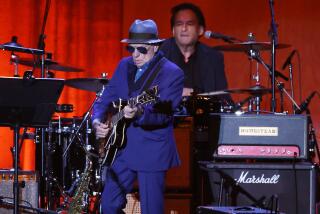 INGLEWOOD, CA OCTOBER 17, 2024 - Van Morrison performs onstage at "Life Is a Carnival: A Musical Celebration of Robbie Robertson" held at the Kia Forum on October 17, 2024 in Los Angeles, California. (Michael Blackshire/Los Angeles Times)