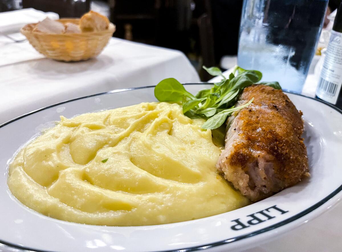 Pied de porc (pig trotter) with potato puree at Brasserie Lipp in Paris.