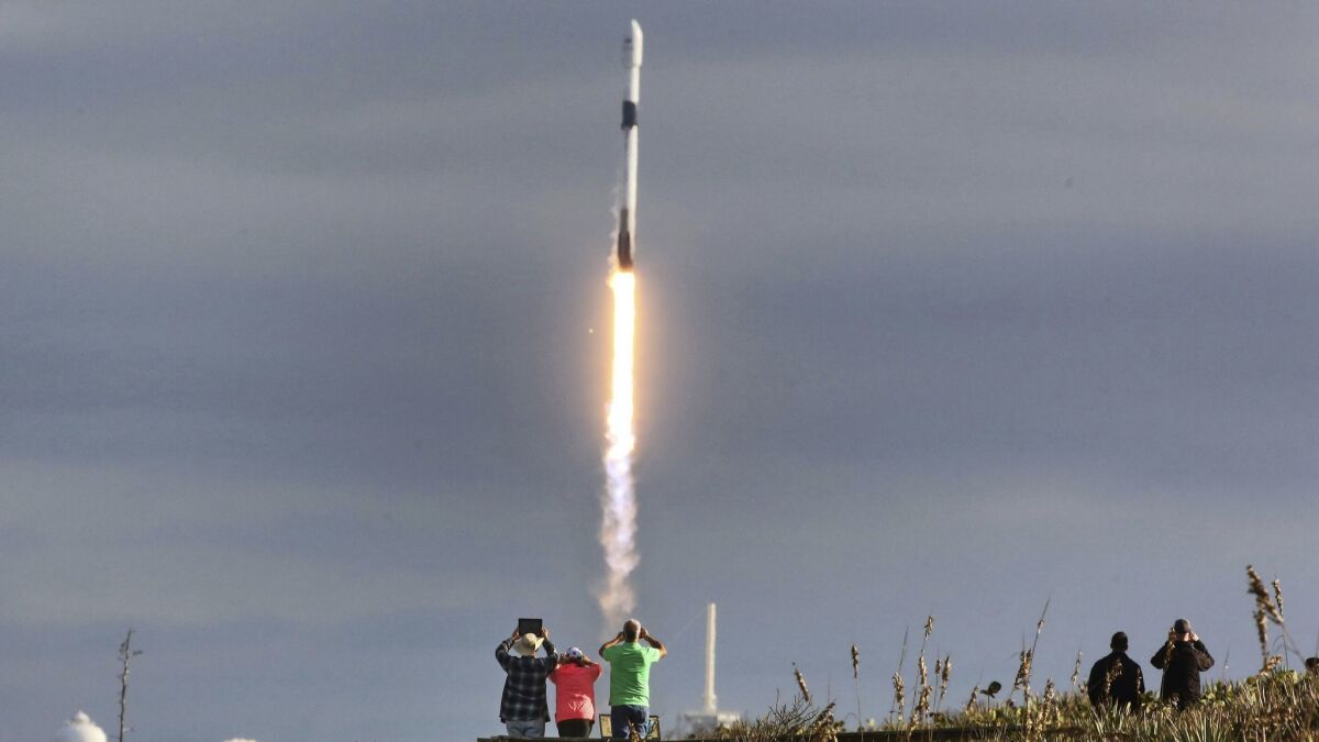 SpaceX launched a communications satellite Thursday from Kennedy Space Center. On Sunday, the Hawthorne company is scheduled to launch more than 60 small satellites in a launch entirely devoted to deploying the tiny spacecraft.
