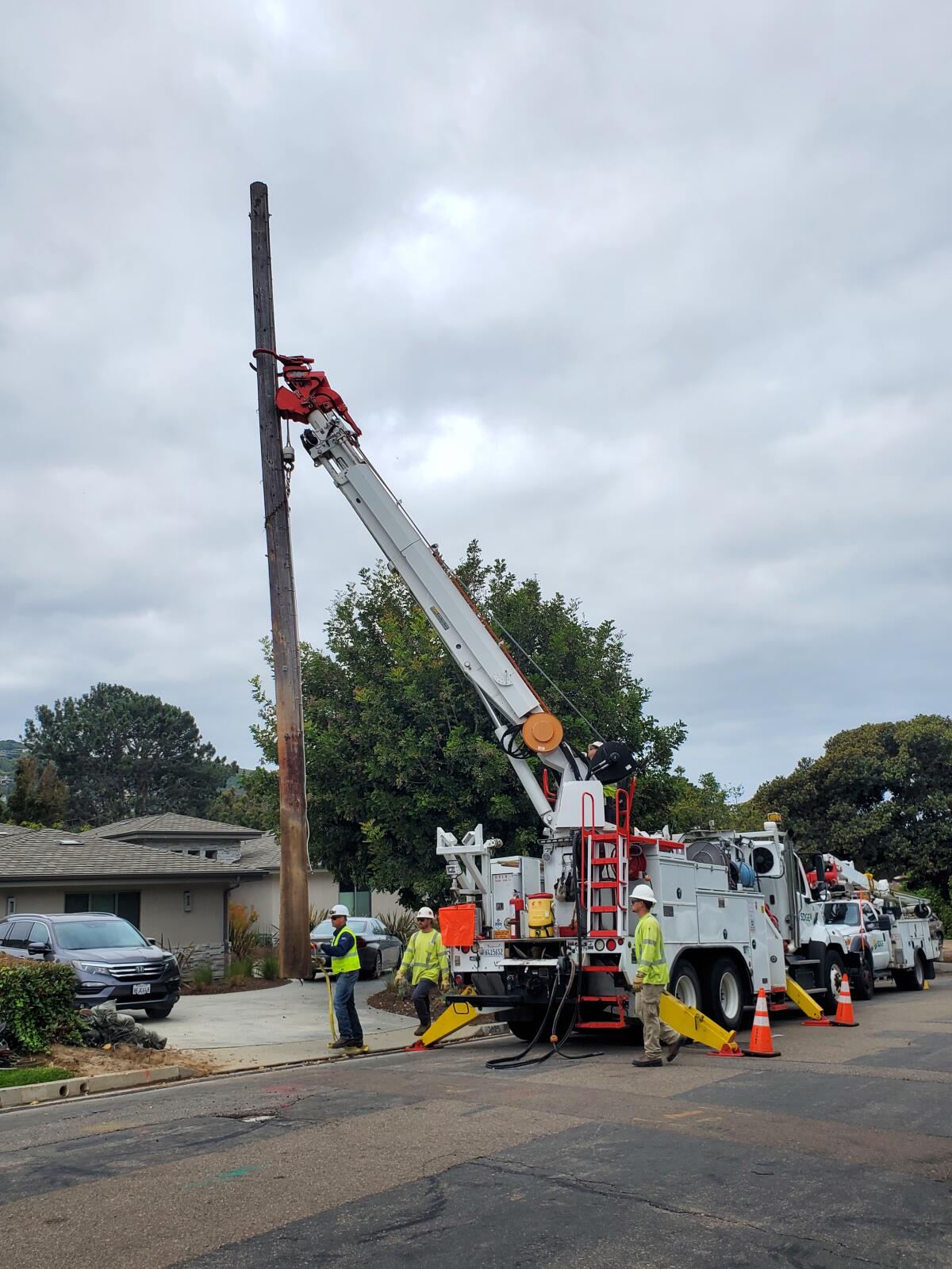 SDG&E removes the last utility pole from Avenida de la Playa east of La Jolla Shores Drive.