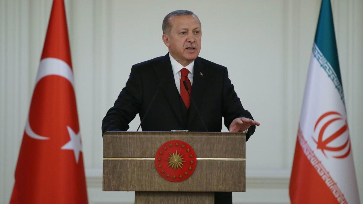 Turkish President Recep Tayyip Erdogan delivers a speech during a Turkey-Iran business forum at Cankaya Palace in Ankara, Turkey, on Dec. 20.