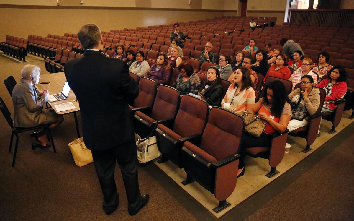 Hank Gmitro, president of Hazard, Young, Attea and Associates -- the search firm hired to gather information for the Los Angeles School Board in their search for a new superintendent -- speaks during a public forum at Van Nuys High School.
