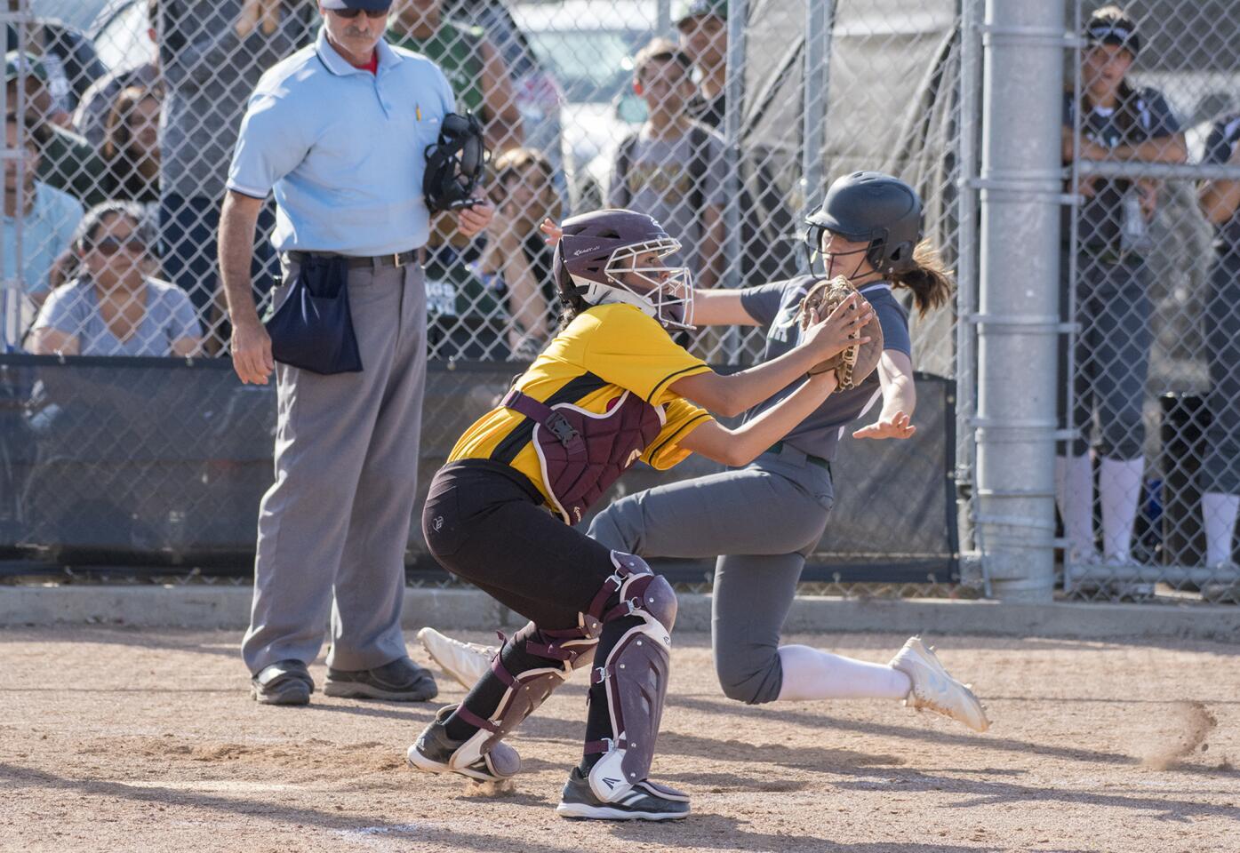 Etancia vs. Costa Mesa in a girls' softball game