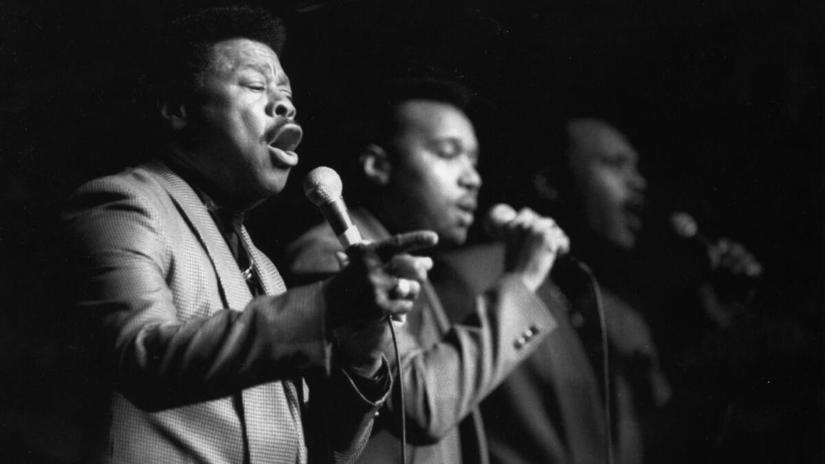 Joe Ligon, left, along with Wilbert Williams, center, and Michael McCowin of the Grammy-winning gospel group Mighty Clouds of Joy.