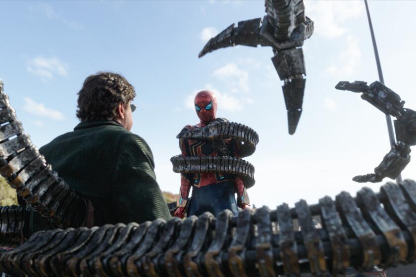 Doc Ock (Alfred Molina) and Spider-Man battle it out in Columbia Pictures' SPIDER-MAN: NO WAY HOME. Doctor Octopus is the first villain who faces off against Tom Holland's present-day Spider-Man in an extended action sequence set on New York's Alexander Hamilton Bridge in the film "Spider-Man-No Way Home." The sequence was one of the more difficult ones for the production because it involved live action photography from the set in Atlanta, rotoscoping and an enormous three-square mile digital environment build. It was so tricky that not only is Spider-Man often completely CG, but Molina's character as well.