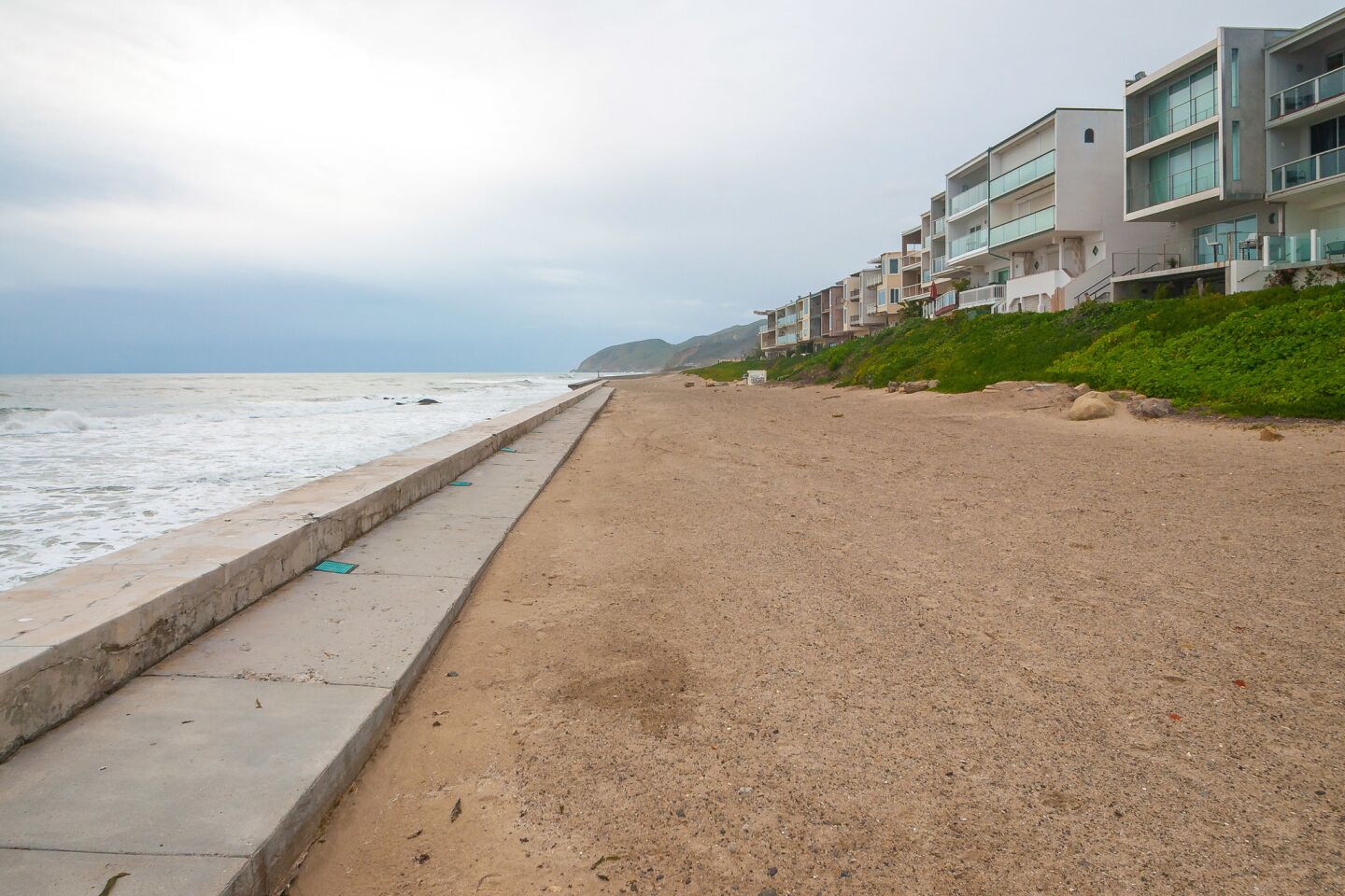 The two-story condo in Malibu takes in panoramic ocean views.