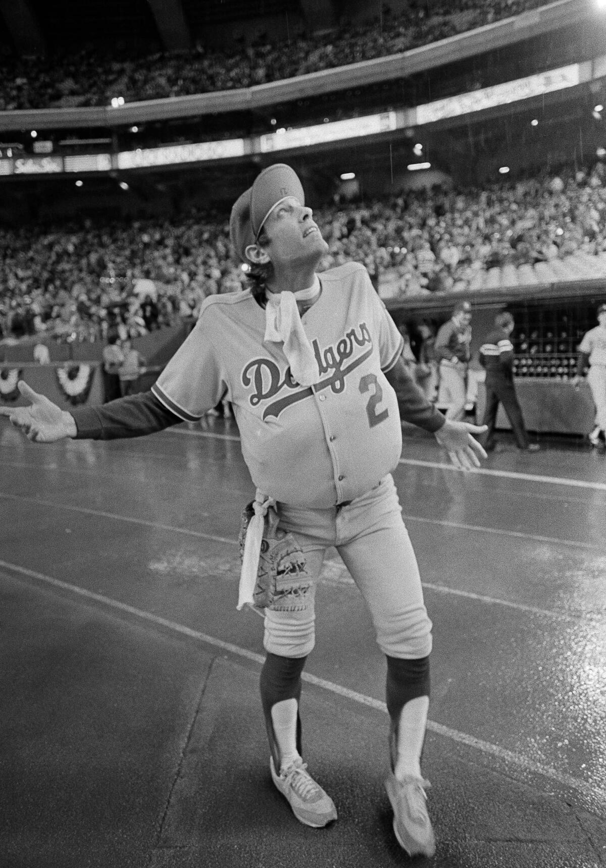 Dodgers outfielder Jay Johnstone wear a padded version of manager Tommy Lasorda’s uniform.