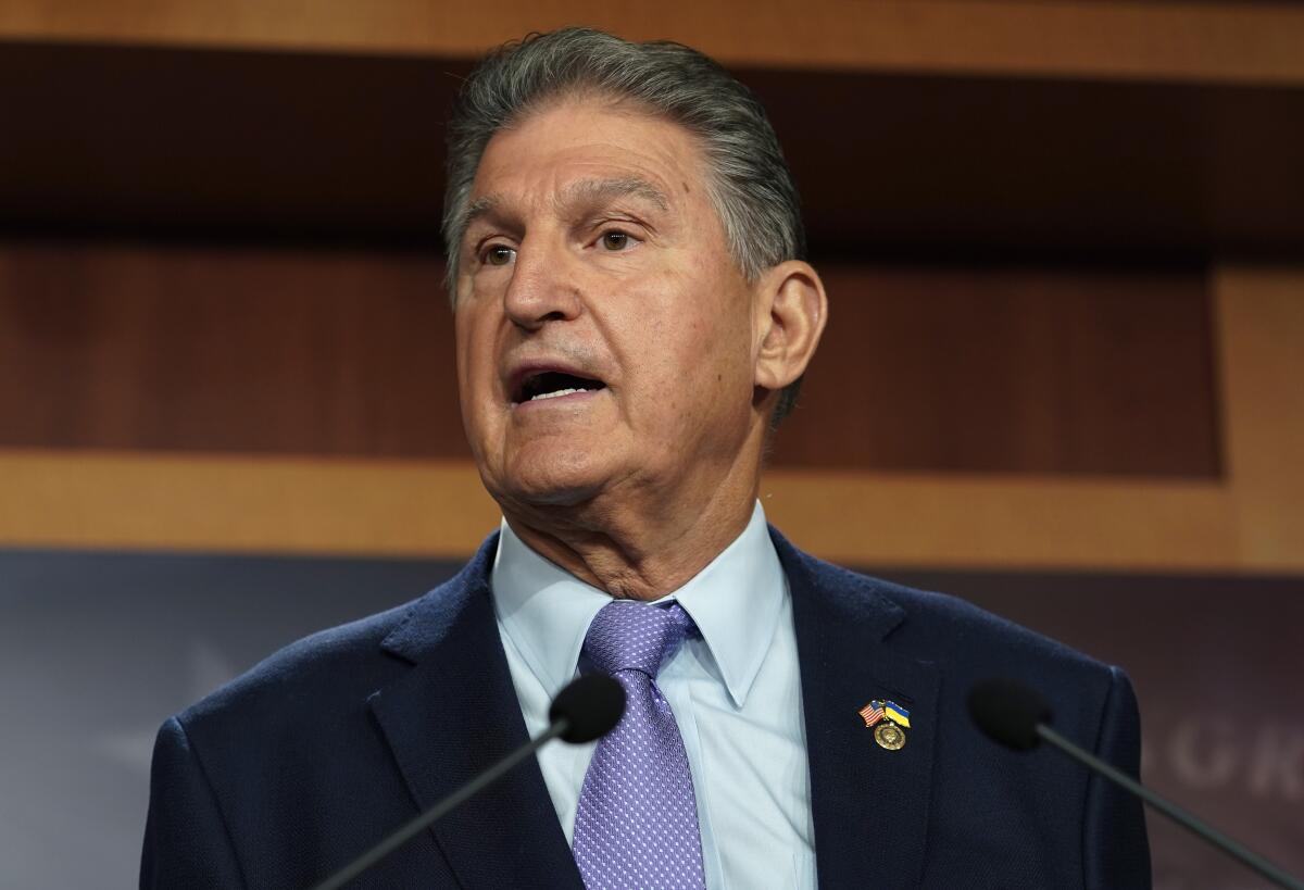 FILE - Sen. Joe Manchin, D-W.Va., speaks during a news conference Tuesday, Sept. 20, 2022, at the Capitol in Washington. President Joe Biden on Saturday was criticized by Manchin for being “cavalier” and “divorced from reality” the day after vowing to shuttered coal fired electric plants and lean heavier on wind and solar energy in the future. (AP Photo/Mariam Zuhaib, File)