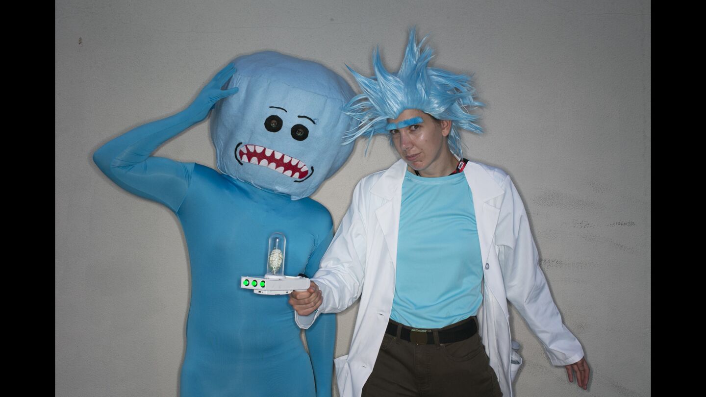 Adam Johnson as Mr. Meeseeks, left, and Jen Johnson as Rick from the "Rick and Morty" cartoon at Comic-Con International 2016.