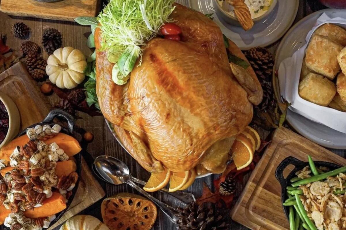 Herb-roasted turkey, brown butter glazed yams and biscuit stuffing are on the Thanksgiving menu at Yardbird.