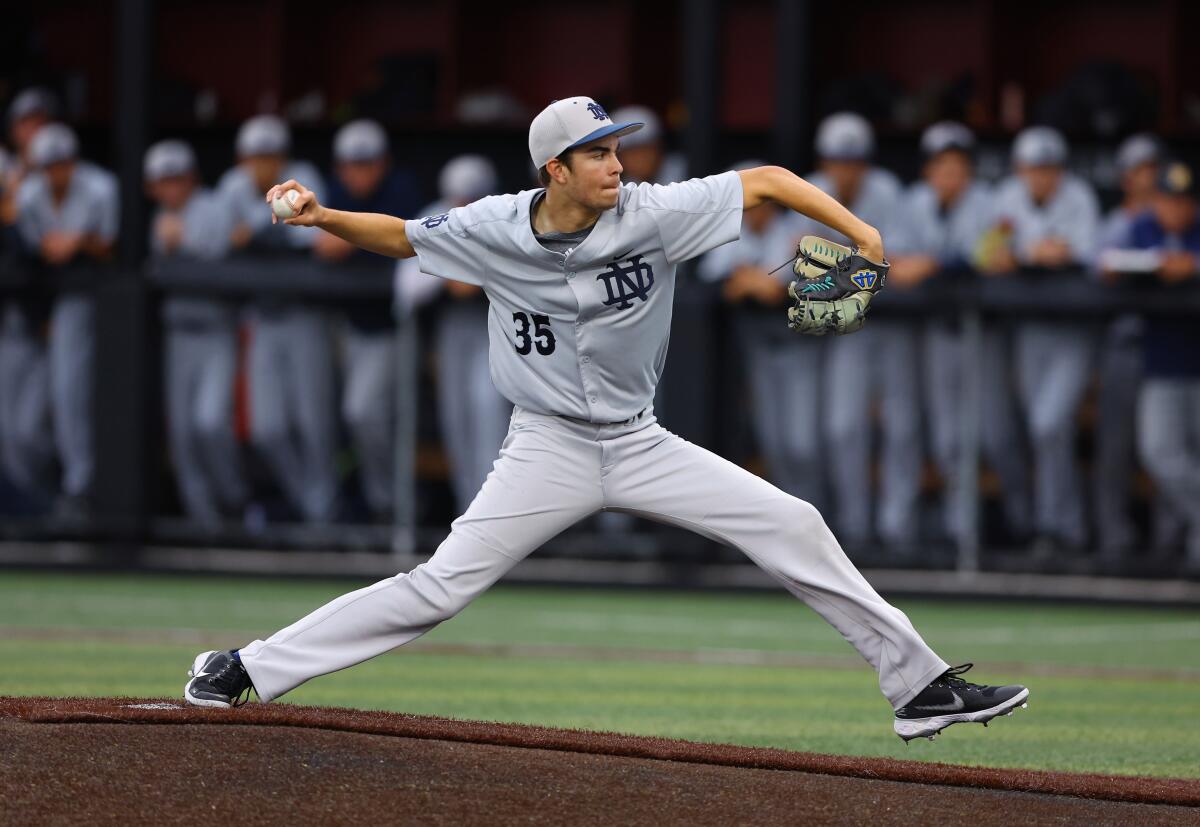 Notre Dame High pitcher Oliver Boone unleashes a pitch.