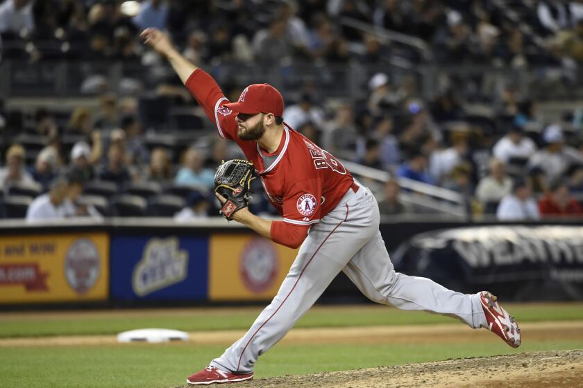 Angels relief pitcher Cam Bedrosian throws against the Yankees early this season at Yankee Stadium.