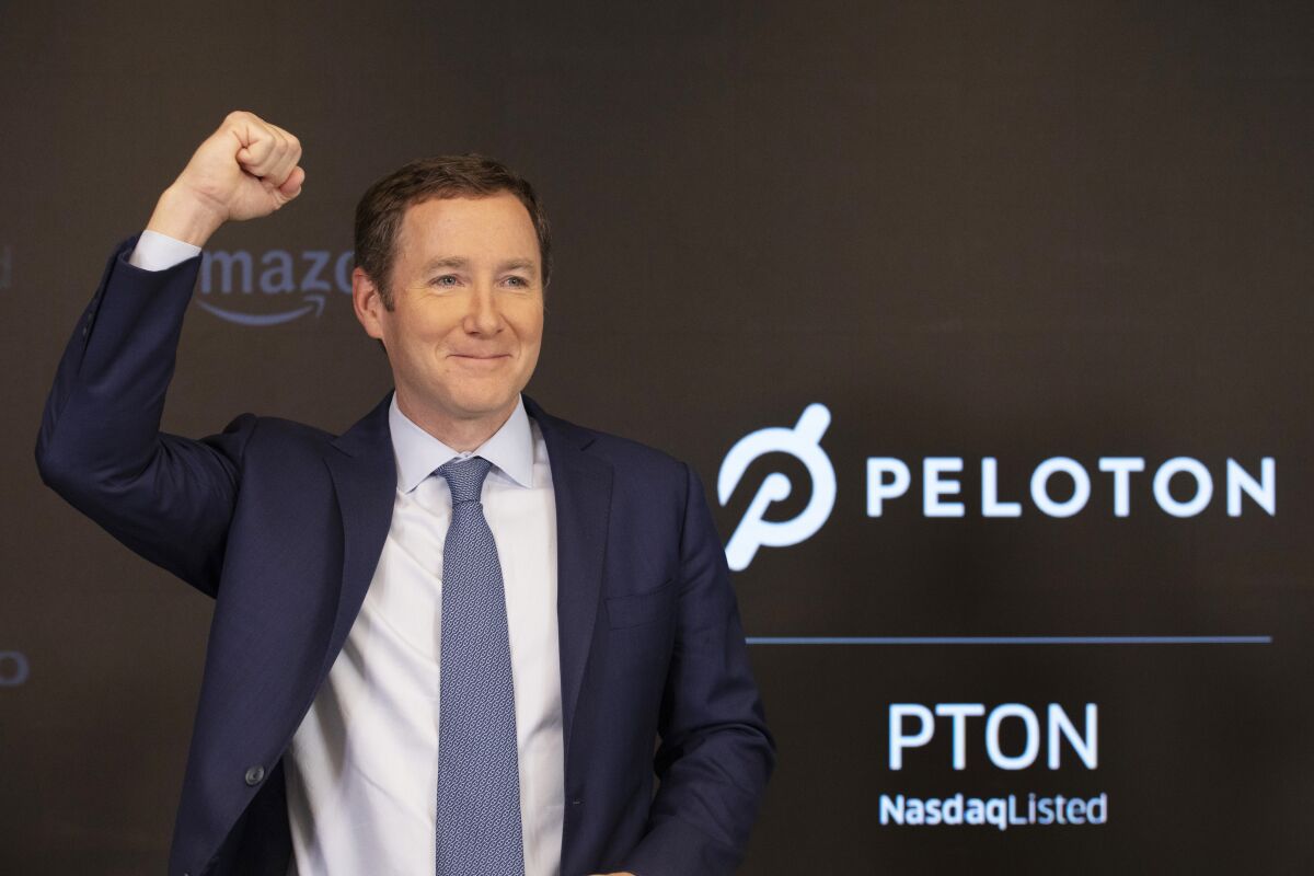 Peloton CEO John Foley celebrates at the Nasdaq MarketSite before the opening bell and his company's IPO, Sept. 26, 2019 