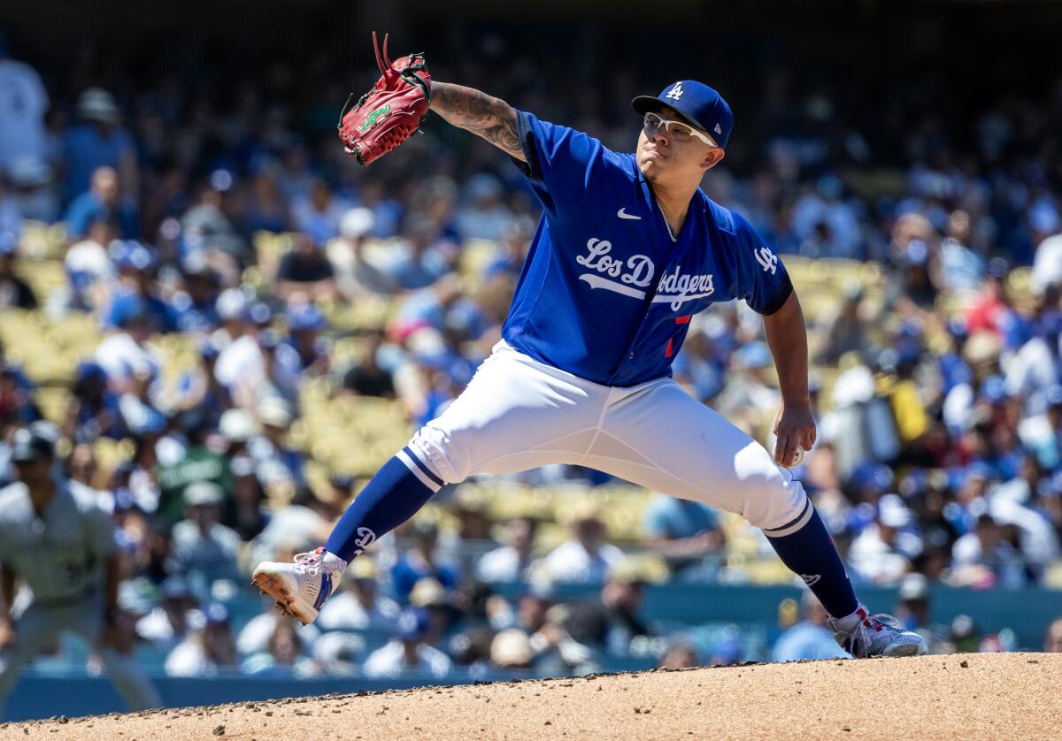Dodgers starting pitcher Julio Urias delivers during a win over the Colorado Rockies on Aug. 13.