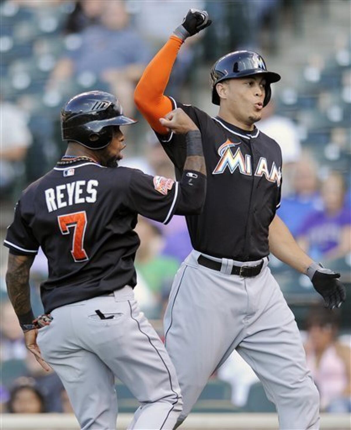 Stanton, Reyes, homer, Marlins beat Rockies, 6-5 - The San Diego  Union-Tribune