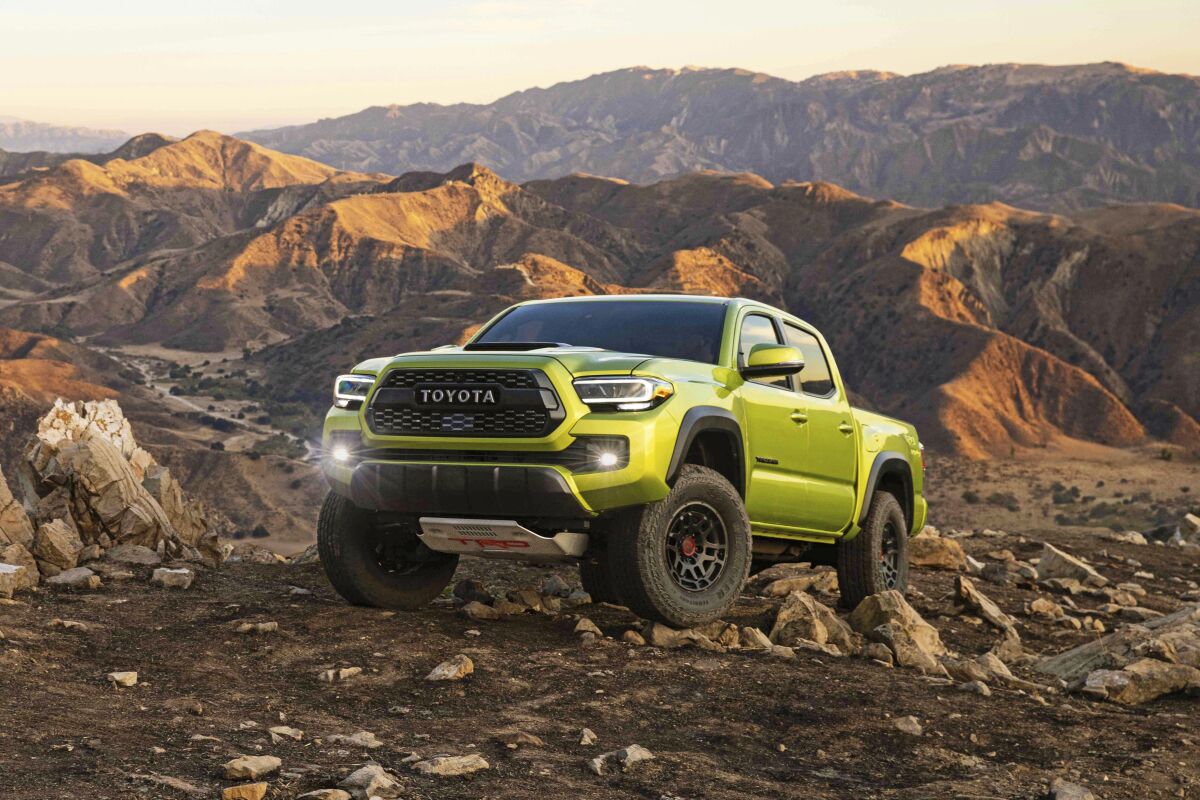 This photo provided by Toyota Motor Sales U.S.A. shows the 2022 Toyota Tacoma. It excels at off-roading capability and comes in a wide variety of configurations. (Courtesy of Toyota Motor Sales U.S.A. via AP)
