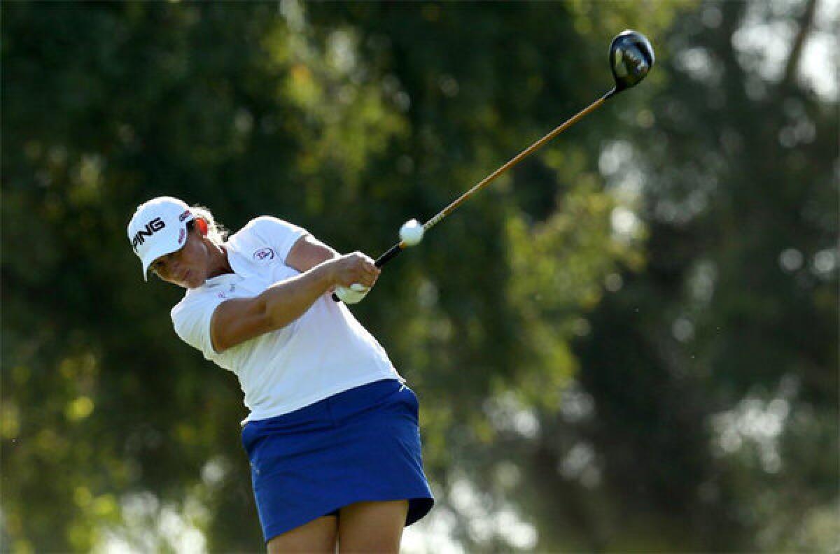 Angela Stanford hits her tee shot on the 16th hole during Friday's round of the Kraft Nabisco Championship.