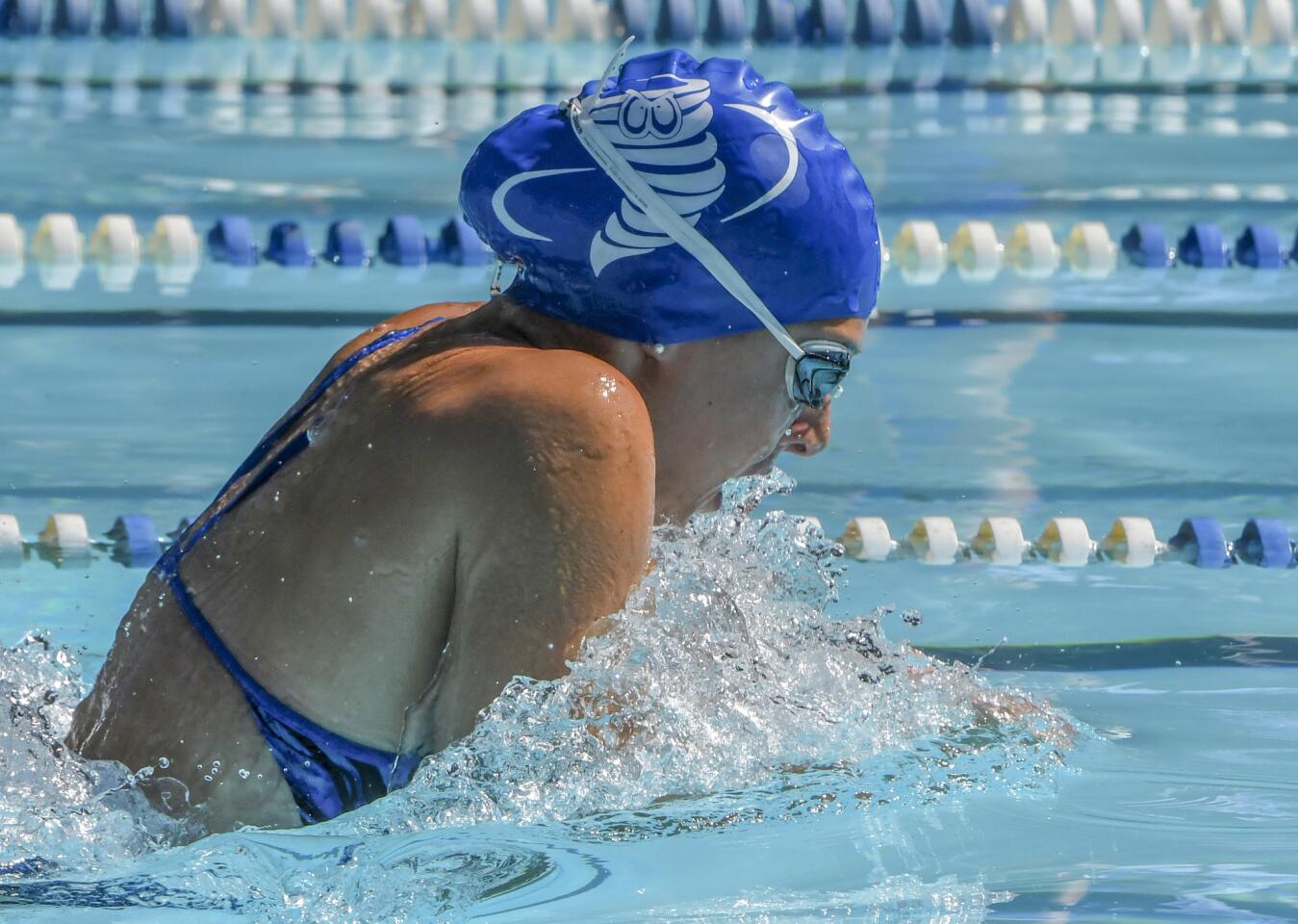Clemens Crossing's Jessie Rothrock powers through the water in the 15-18 girls 50 yard breaststroke at the Columbia Neighborhood Swim League meet between host Clemens Crossing and Harper's Choice Saturday morning in Columbia.