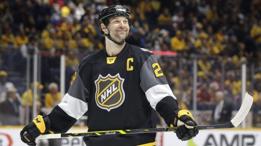 Forward John Scott looks into the stands during the NHL All-Star championship game against the Atlantic Division on Jan. 31, 2016.